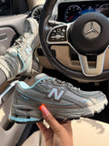 Grey & Blue 740 Sneakers
